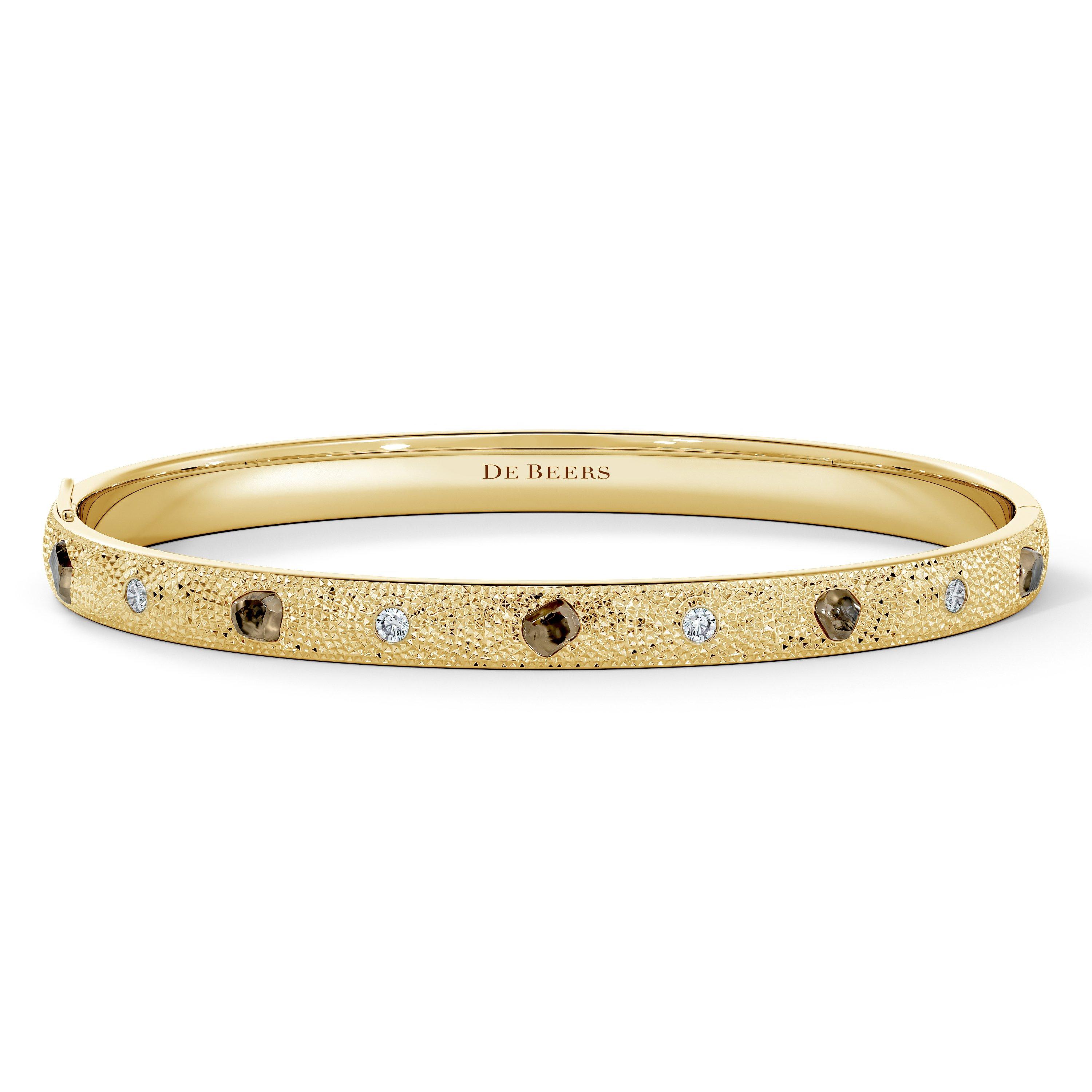 Talisman bangle in yellow gold | De Beers UK