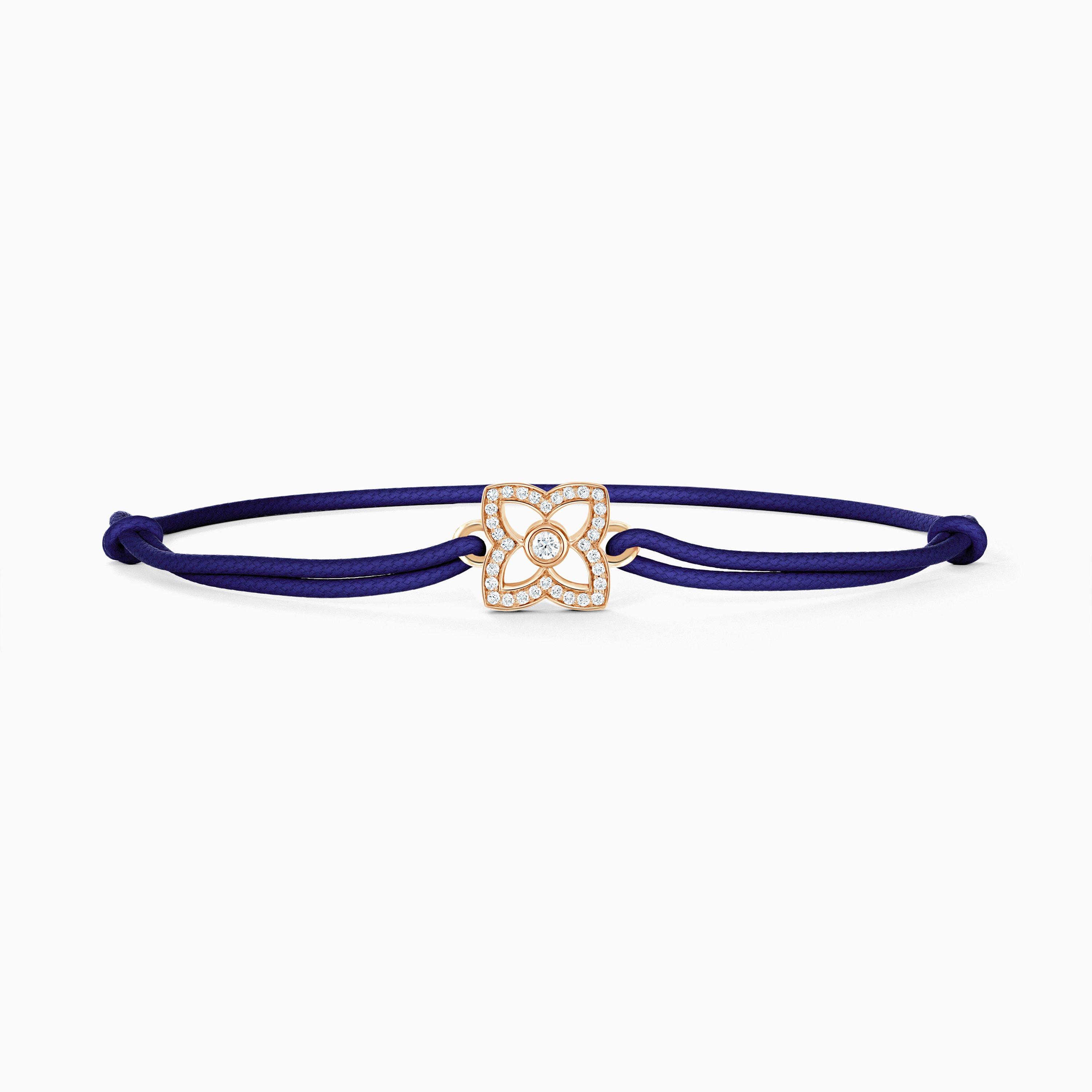 Lotus by DE BEERS rose gold diamond bracelet on blue cord, image 1