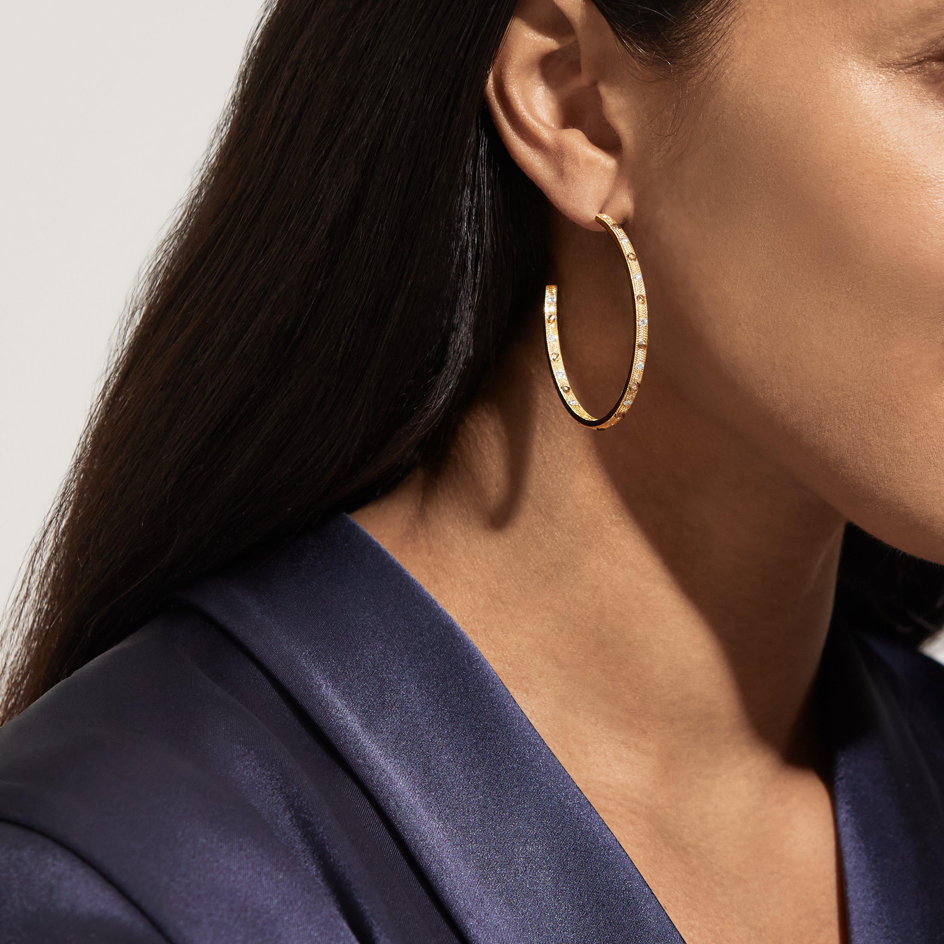 Talisman hoop earrings in yellow gold