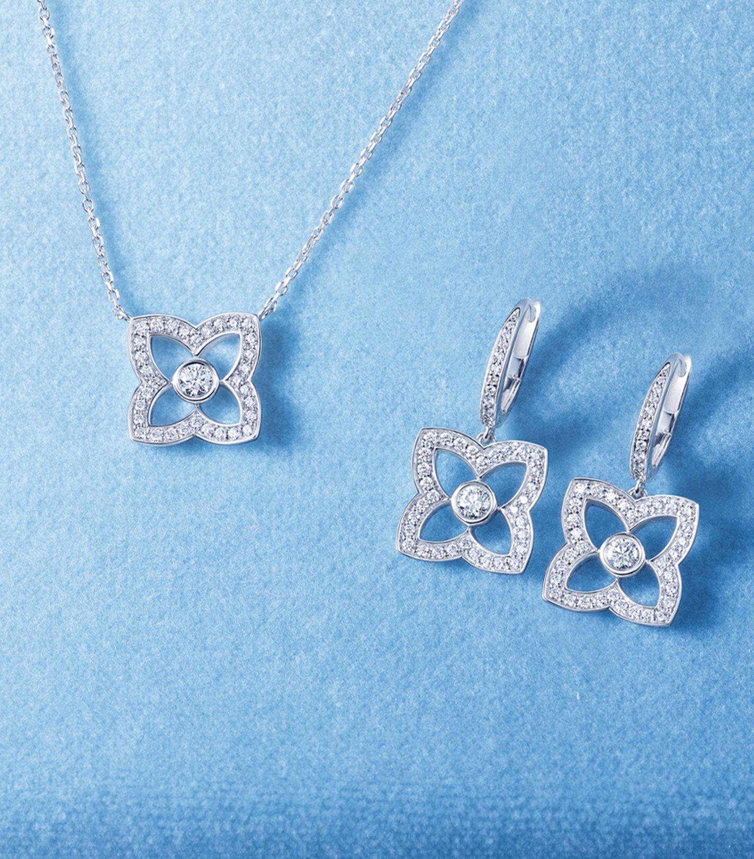 Black and white picture Adowa wearing Talisman yellow gold medal pendant