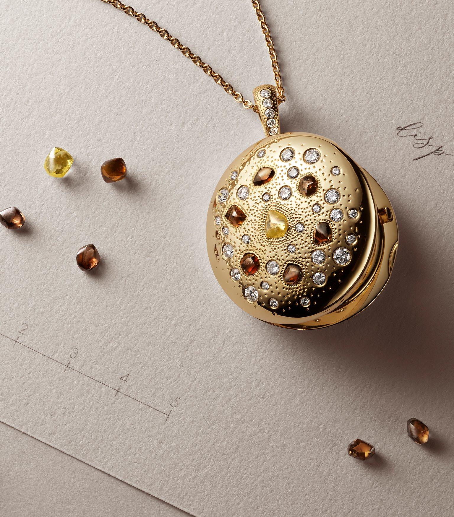 Black and white picture Adowa wearing Talisman yellow gold medal pendant