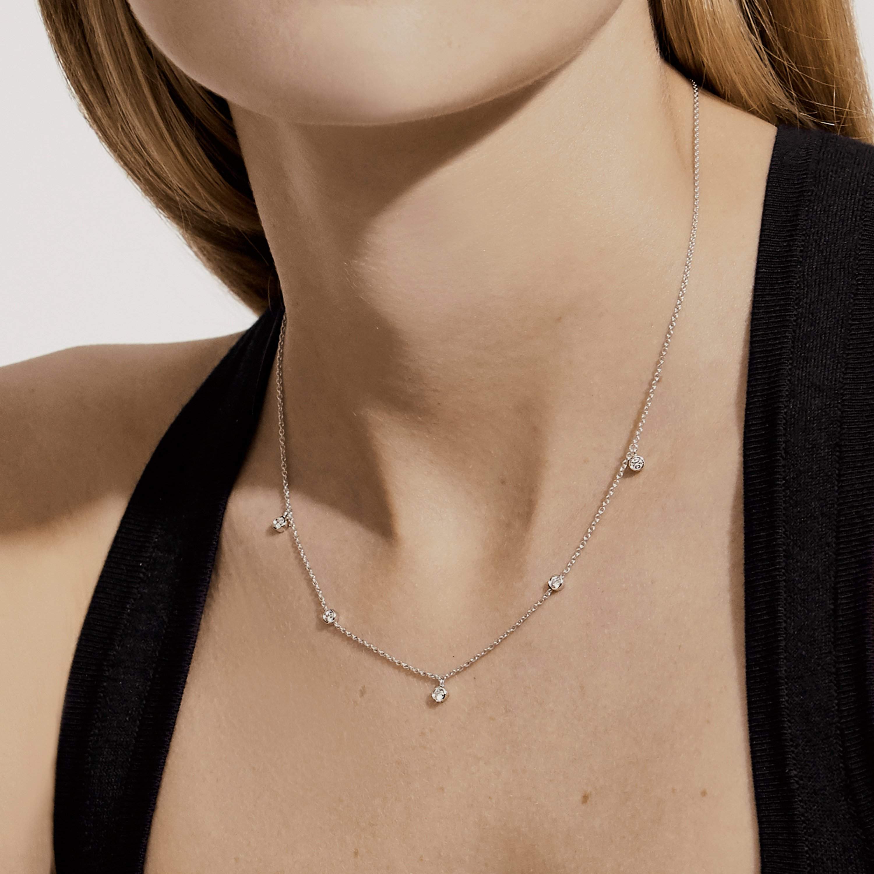 Clea five diamond necklace in white gold | De Beers US Clea five diamond necklace in white gold | De Beers US