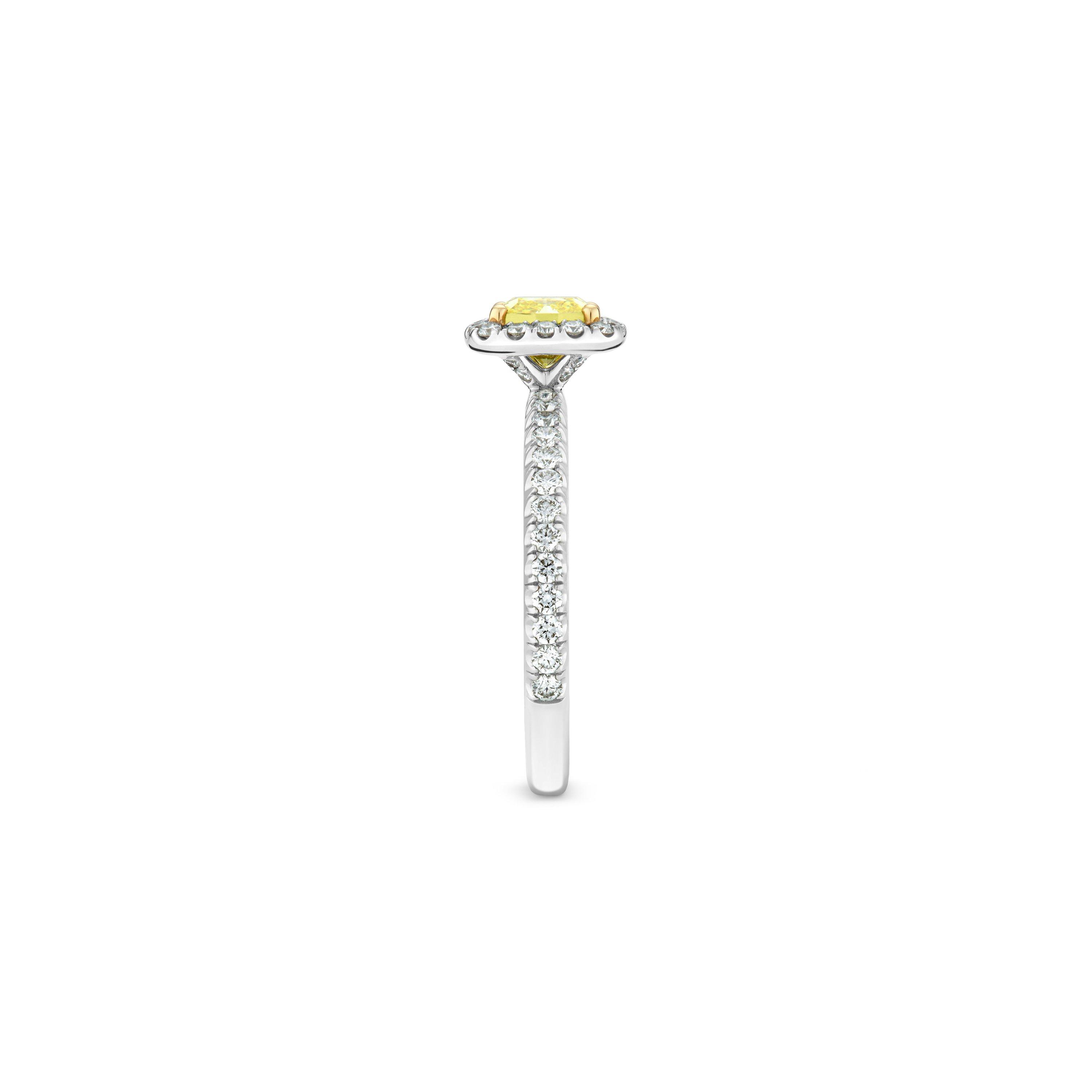 Aura fancy greenish yellow pear-shaped diamond pendant