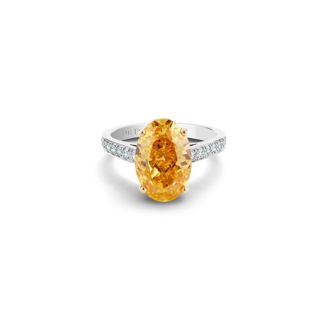 Solitaire Old Bond Street diamant fancy vivid yellow orange taille ovale