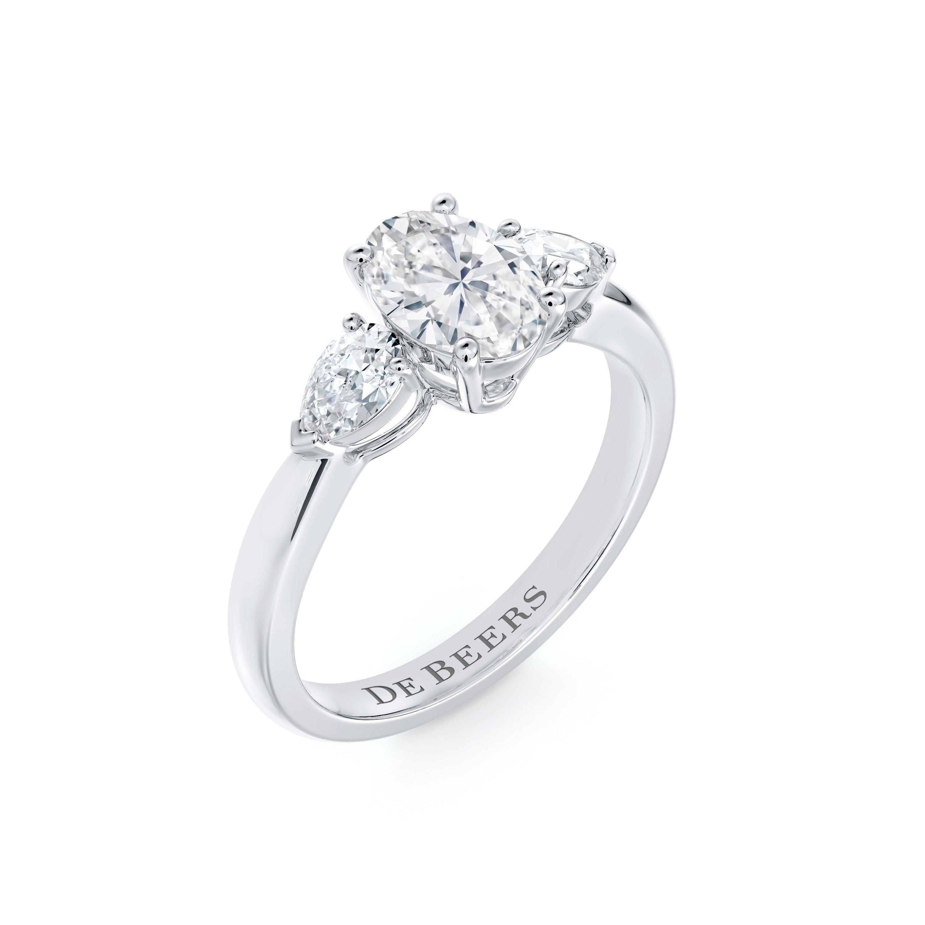 DB Classic Oval-Shaped Centre with Pear-Shaped Side Stones Diamond Ring