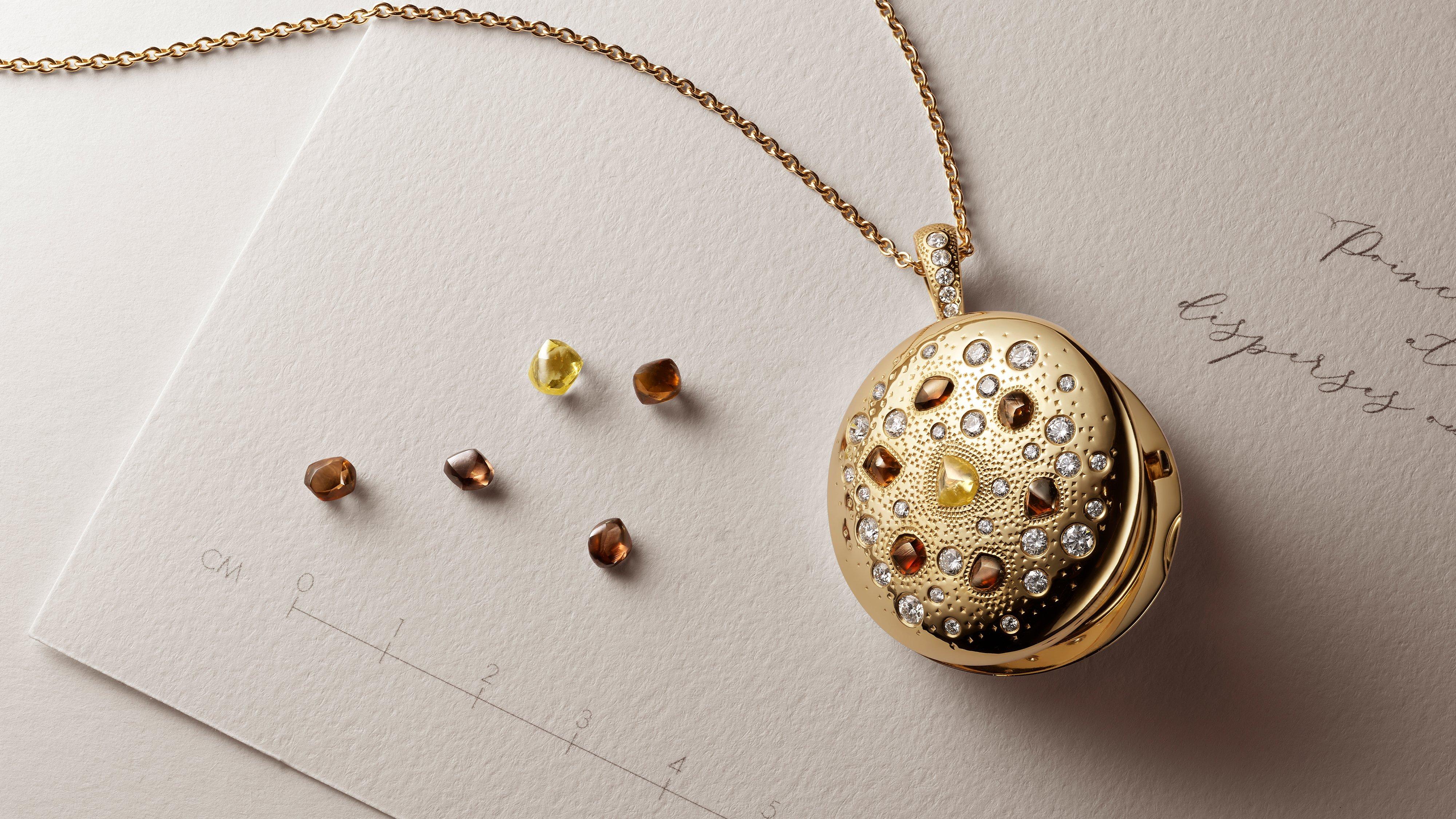 Black and white picture Adowa wearing Talisman yellow gold medal pendant