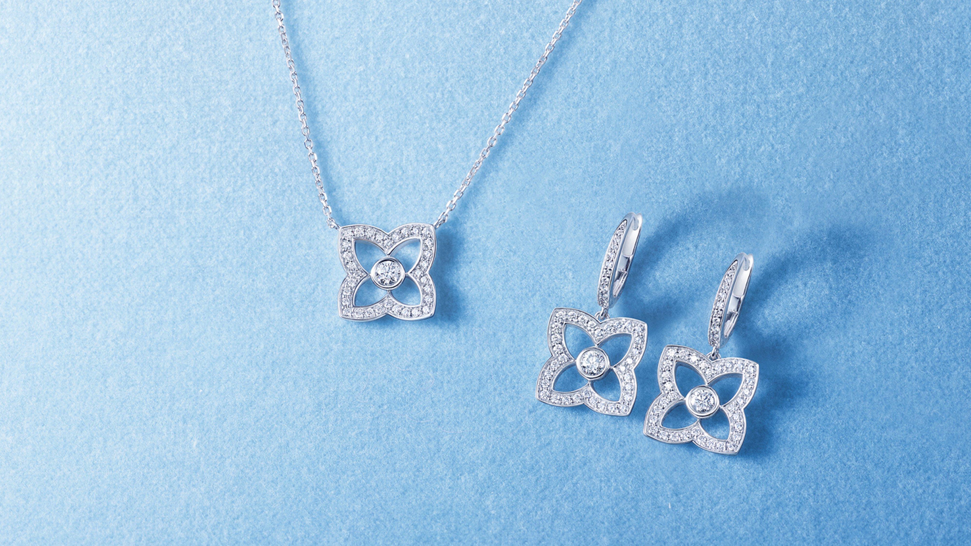 Black and white picture Adowa wearing Talisman yellow gold medal pendant