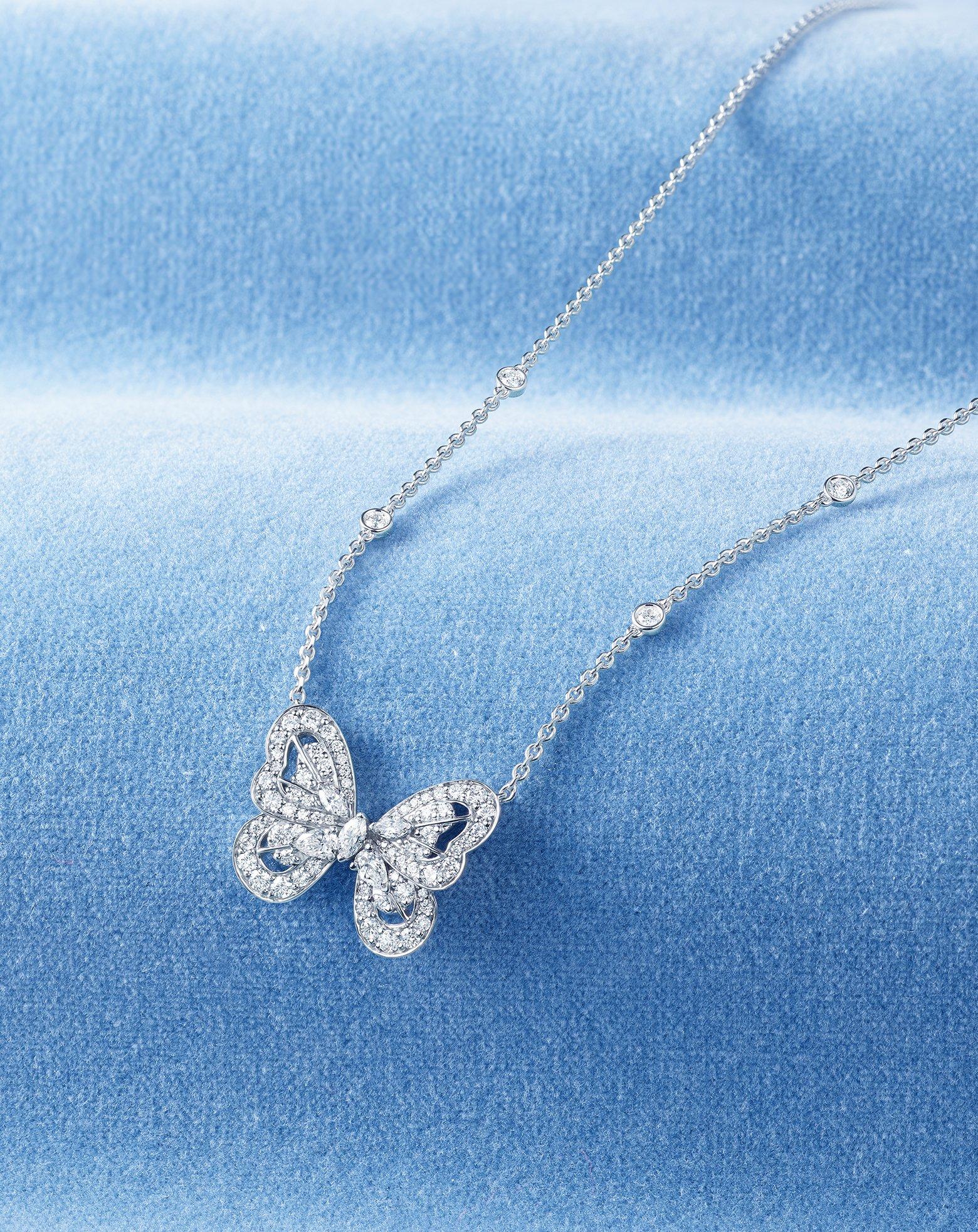  butterfly pendant in white gold