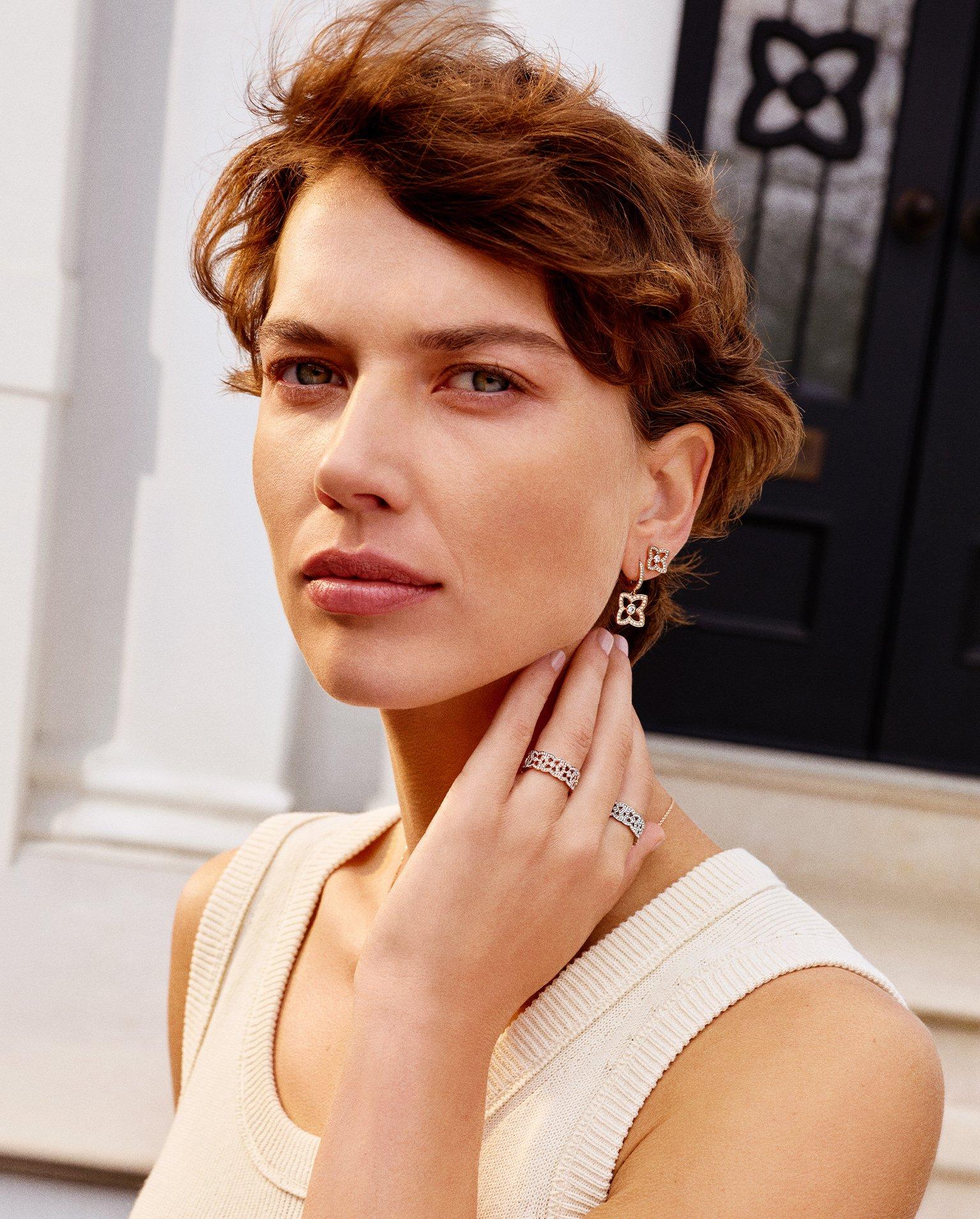 Lotus on model wearing Lotus by DE BEERS jewellery collection