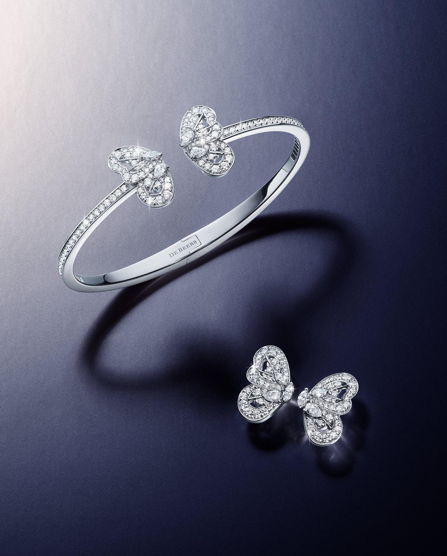 Lotus on model wearing Lotus by DE BEERS jewellery collection