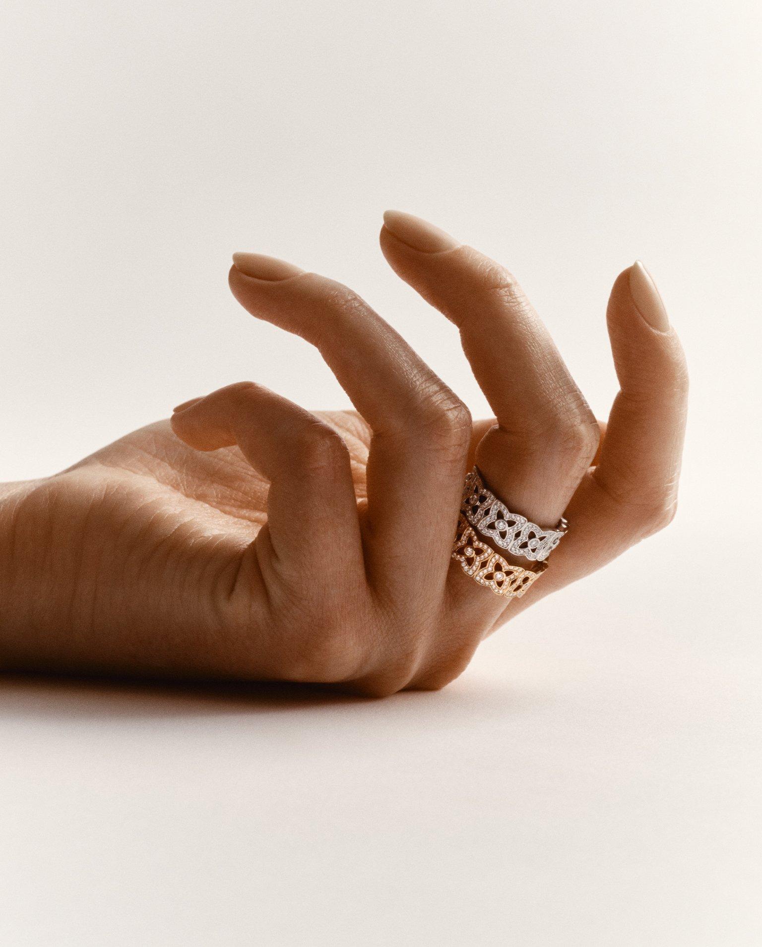 Lotus on model wearing Lotus by DE BEERS jewellery collection