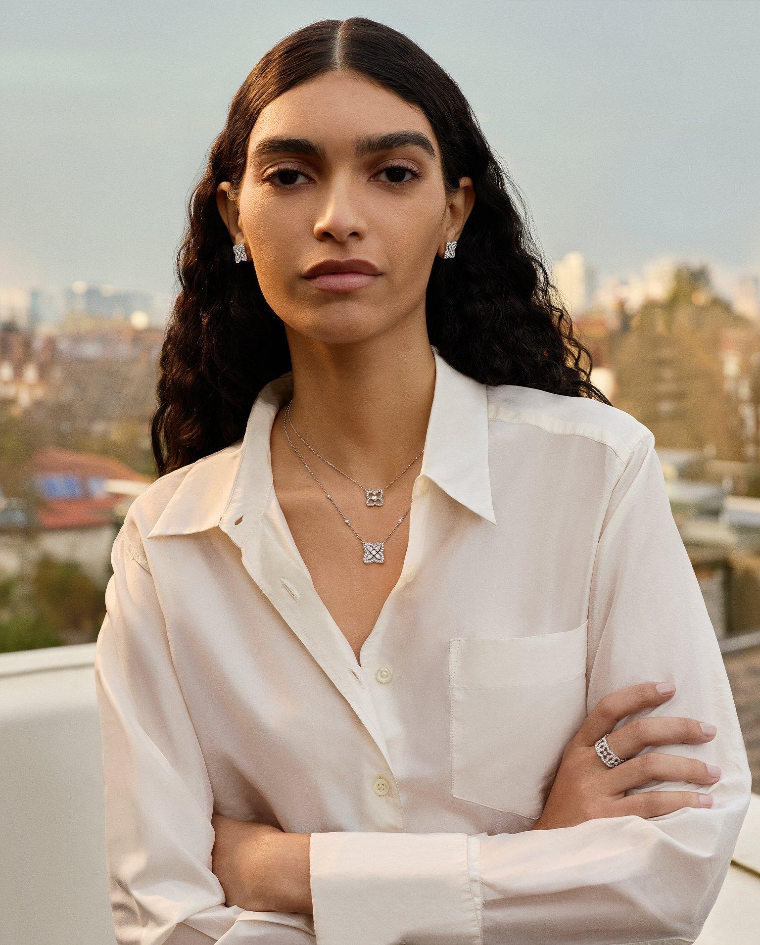 Lotus on model wearing Lotus by DE BEERS jewellery collection