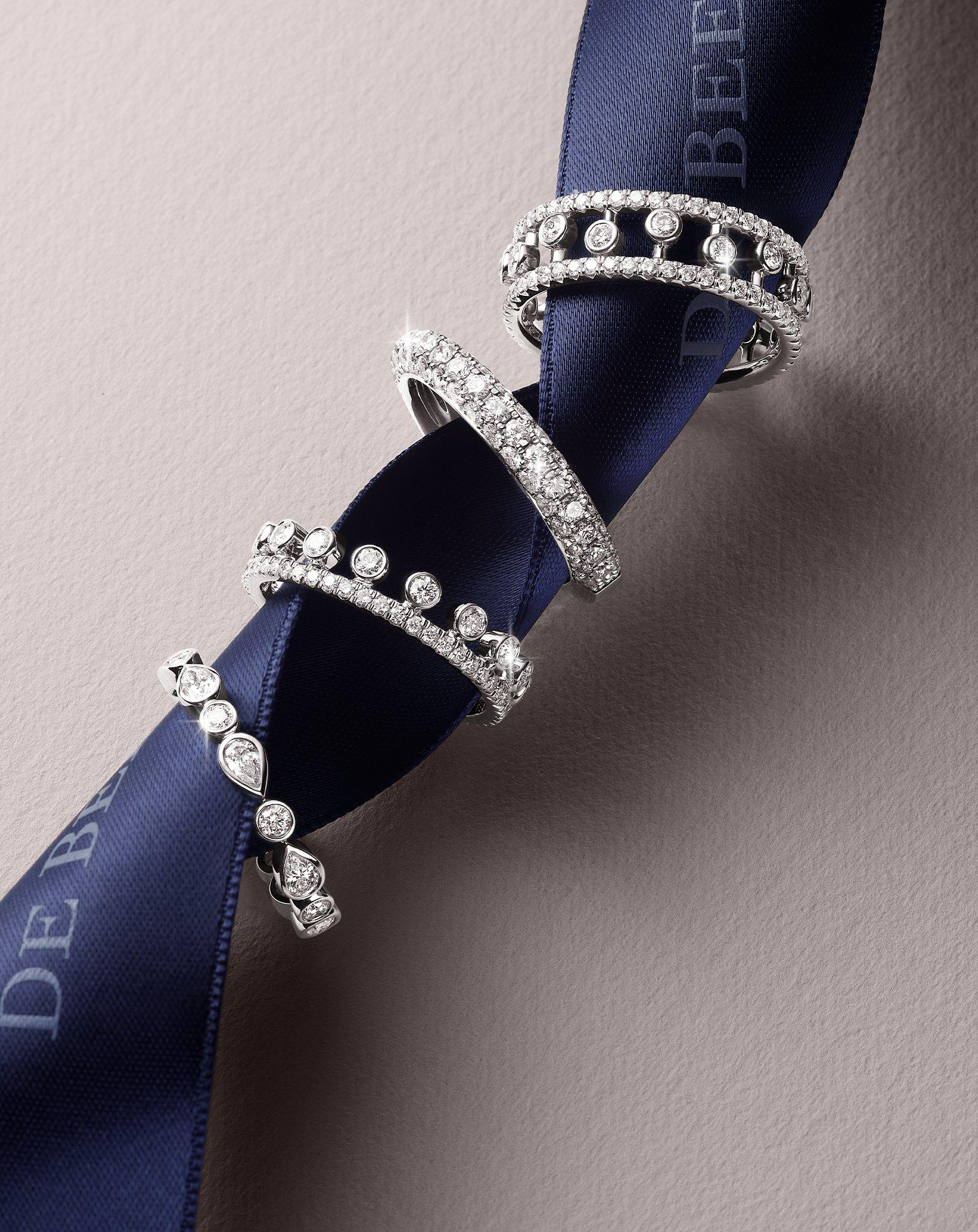 Lotus on model wearing Lotus by DE BEERS jewellery collection