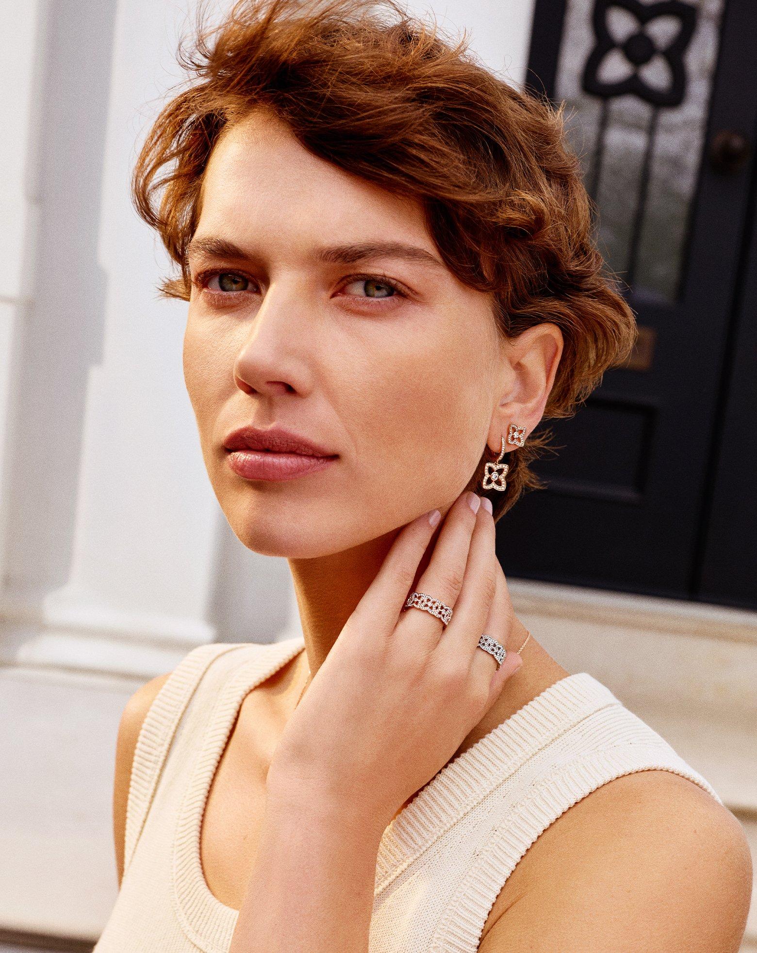 Lotus on model wearing Lotus by DE BEERS jewellery collection