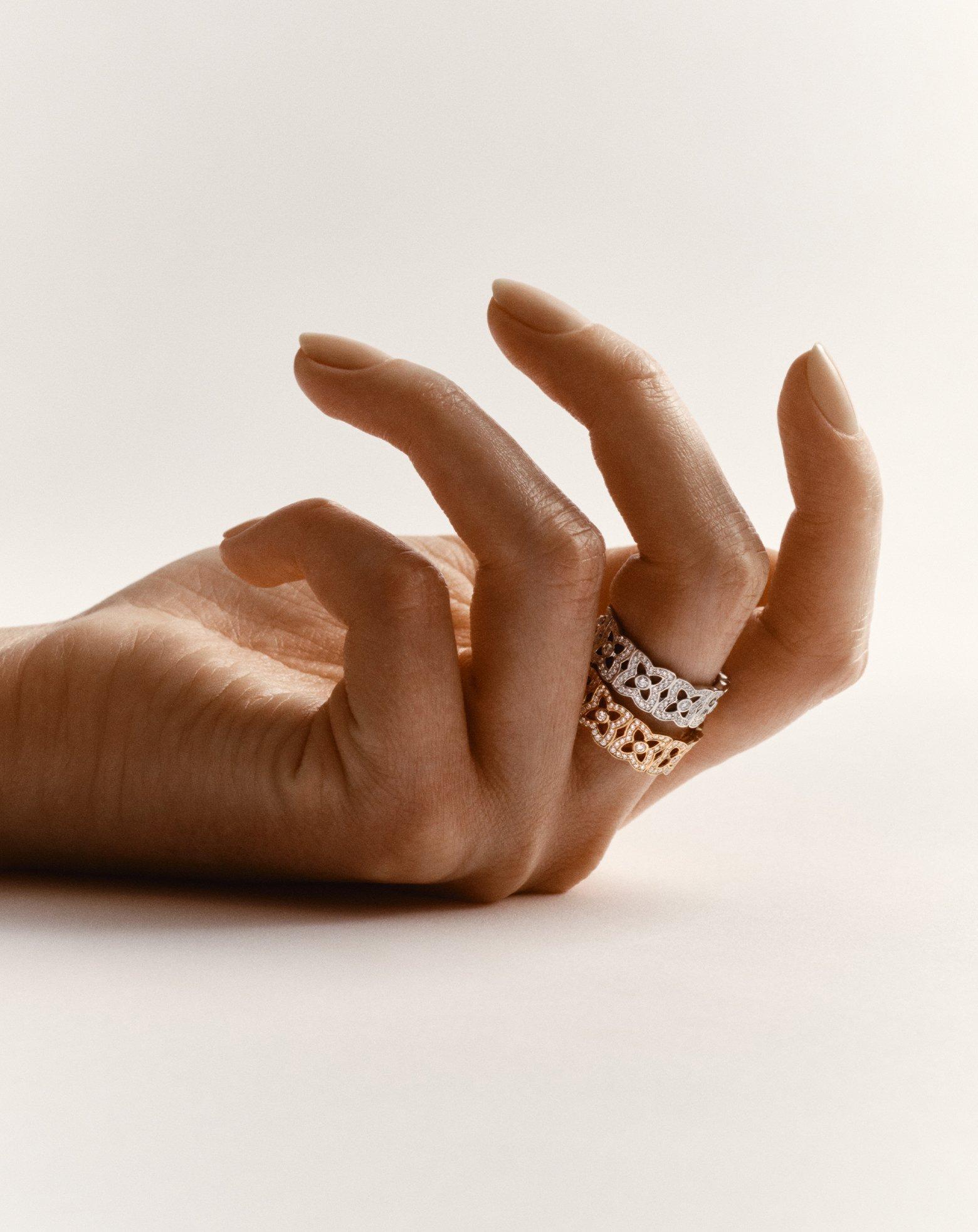 Lotus on model wearing Lotus by DE BEERS jewellery collection