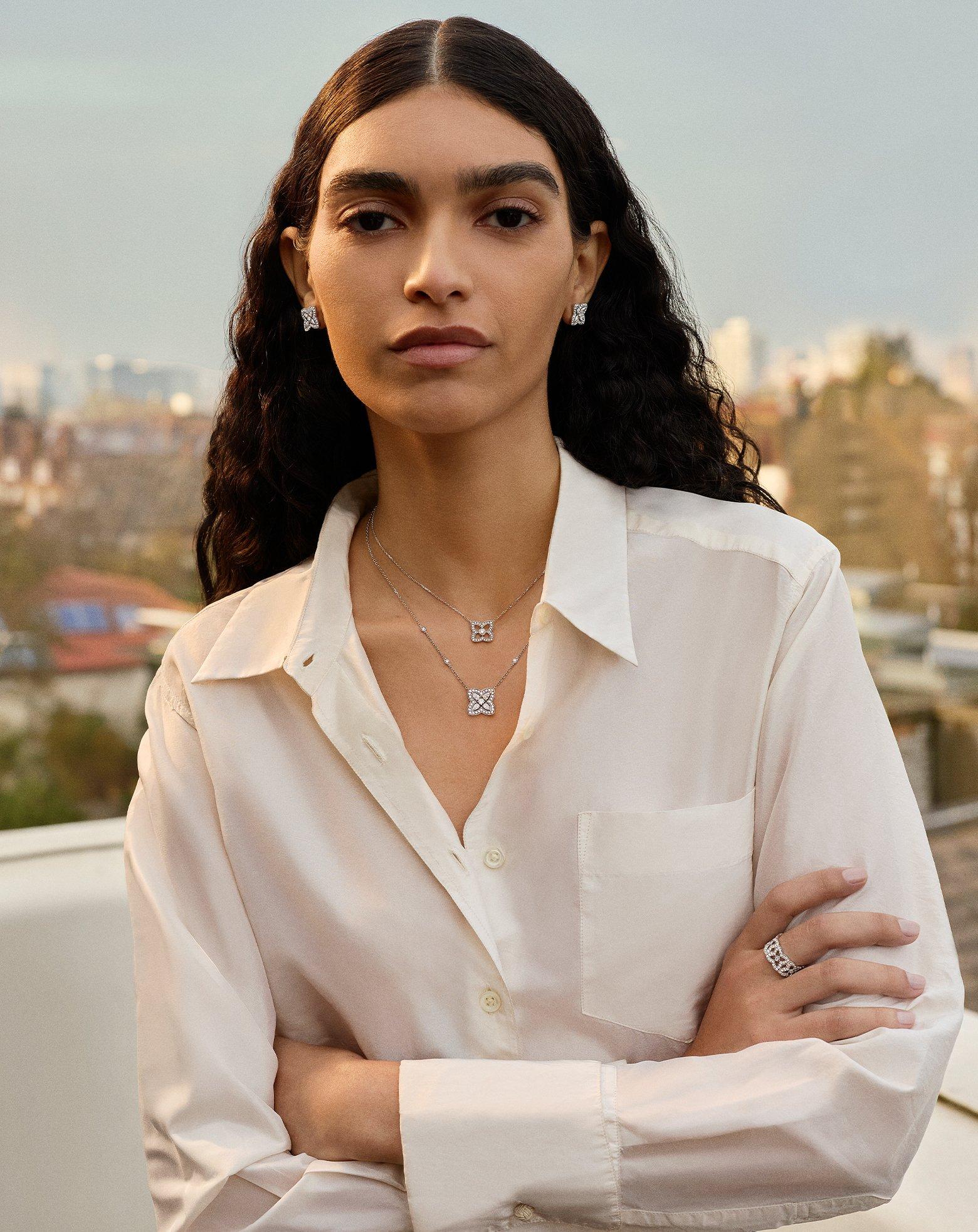 Lotus on model wearing Lotus by DE BEERS jewellery collection