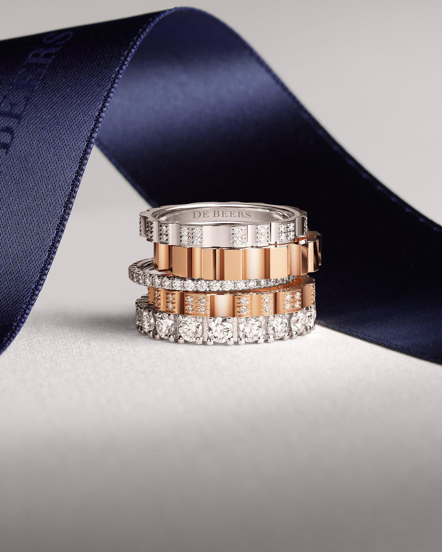 Classics Jewellery Collection white gold Necklace and Earrings with yellow diamond on blue background