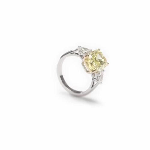 DB Classic fancy intense yellow cushion-cut diamond ring | De Beers CA